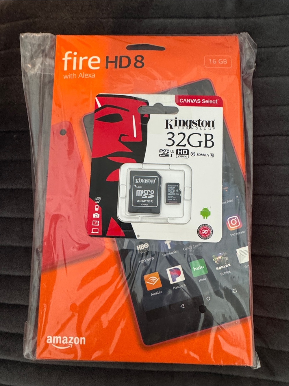 Amazon Fire HD 8 Tablet with Orange Packaging and Red Accent